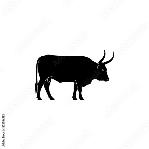 Powerful Silhouette of a Standing Bull or Ox with Prominent Horns