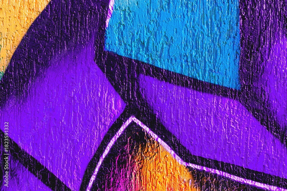 Obraz premium Vibrant abstract graffiti texture featuring purple, orange, blue. Urban 80s style, bold lines, vivid colors. Street art, posters, digital backgrounds, 80s-inspired modern visuals.