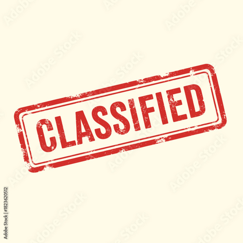 A distressed red rubber stamp impression showing the word CLASSIFIED on a cream background.