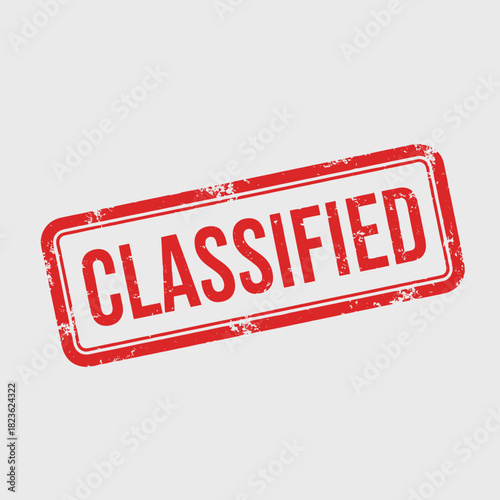 A red grunge-style rectangular stamp with the word 'CLASSIFIED' in white uppercase letters, set against a light gray background.