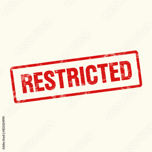 A red rubber stamp with the word "RESTRICTED" in capital letters on a beige background.