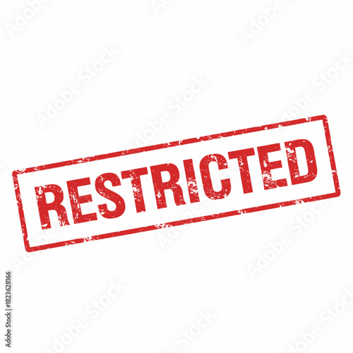 A red grunge rubber stamp imprint with the word RESTRICTED in a rectangular frame.