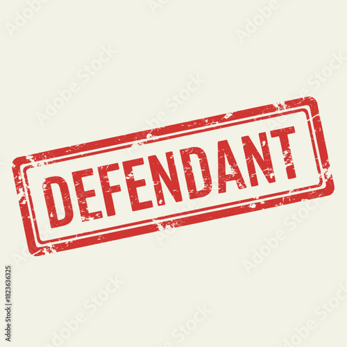 A red rectangular stamp with the word DEFENDANT printed in white letters.