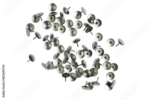 Scattered metallic push pins isolated on transparent background
