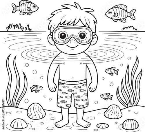 Young boy with snorkel gear underwater surrounded by sea life