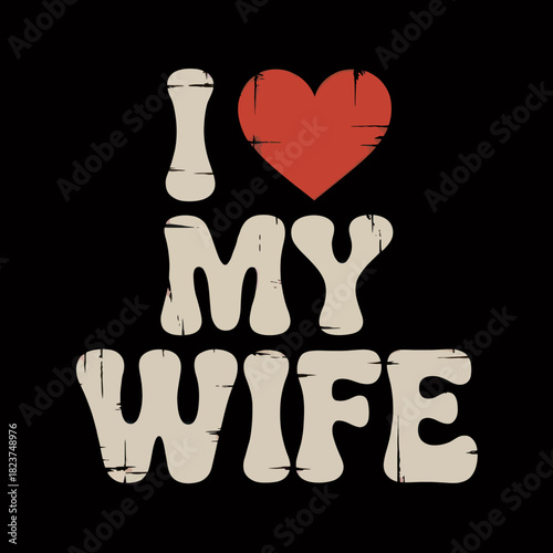 The image features a bold typographic design with the words 'I love my wife.' The phrase uses a heart symbol to replace the word 'love,' set against a black background.