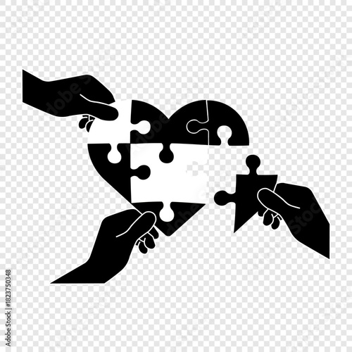 Hands working together to assemble a heart from puzzles