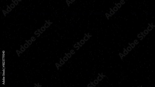 Soft Falling Rain on Deep Black Background with Tiny Water Particles, Minimal Abstract Weather Effect, Seamless Cinematic Loop in 4K