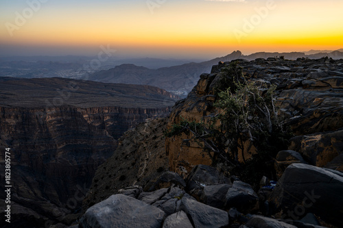 Schilderij op canvas Sunset landscape near Jabal Shams in Al Hajar Mountains, Oman