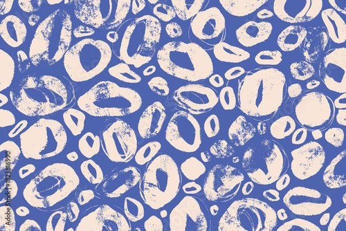 Blue Grunge Dot Pattern. Hand stamped abstract circles with rough textured edges and distressed paint marks on bright blue background. Perfect for media, posters, banners, cards and web.