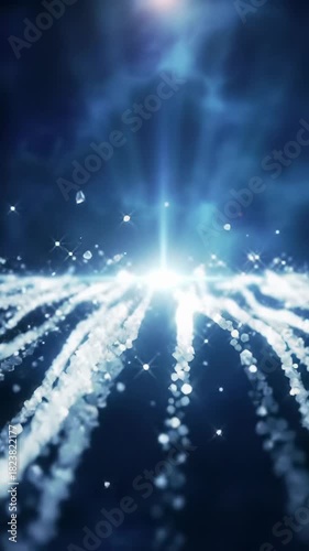 Crystalline, luminescent white particles stream from a central core, swirling against an abstract cosmic void of indigo & blue hues, with lens flare & bokeh. Concept of infinite expansion
