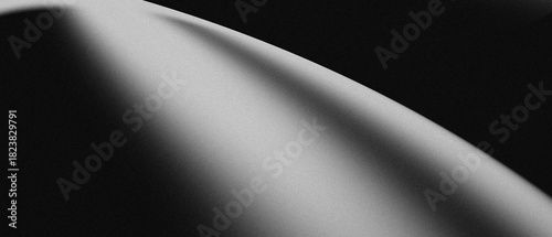 Grainy Black and White Abstract Curve – Minimalist Gradient Background with Smooth Light and Shadow Flow