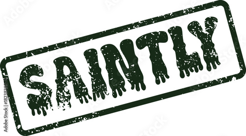 Distressed green rubber stamp bearing the virtuous word Saintly on a clear surface for moral messaging