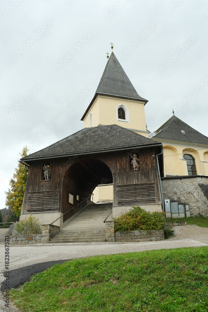 Fototapeta premium Historic Cemetery Church in a European Village.