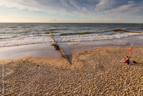 Fototapeta Naklejka Na Ścianę i Meble -  Russia, Zelenogradsk - July 26, 2022: The Baltic Sea coast at sunset