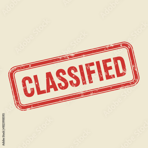 Classified stamp with red text and border on a beige background.