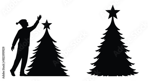 Silhouette of a person decorating a christmas tree with a star and a festive tree