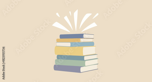 Stack of colorful books with light rays emanating from the top, education concept.