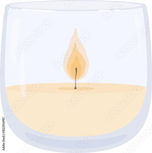 Scented candle burning in glass jar creating warm atmosphere