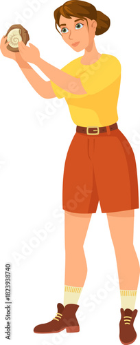 Woman geologist holding ancient spiral ammonite fossil