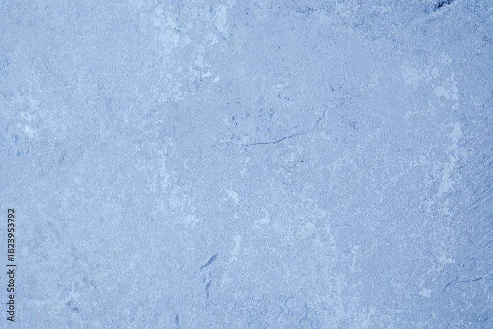 Fototapeta premium Grunge blue wall with textured plaster and worn vintage finish