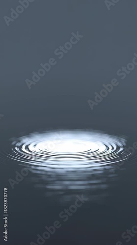 Finger gently tapping liquid surface creating ripple and water reflection with soft light touch and calm atmosphere effect