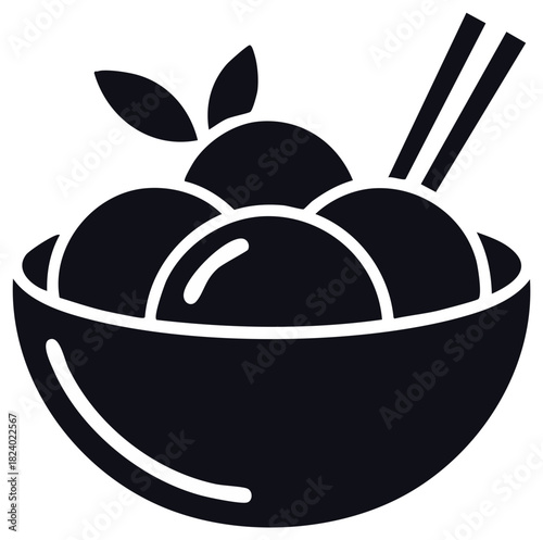 Stylized bowl of dumplings or meatballs with chopsticks and leaves