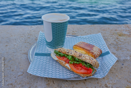 Breakfast at Old Jaffa embankment over Mediterranean sea in Tel Aviv, Israel.