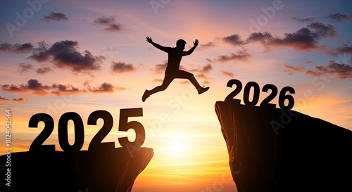 Silhouette of a person jumping to 2026 at sunset symbolic concept