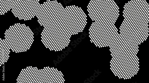 White halftone dots on a black background. Retro comic halftone animation background