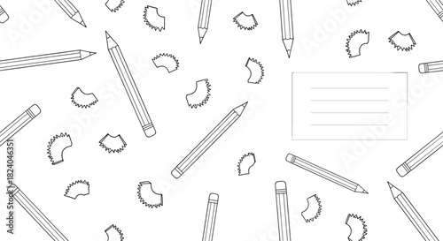 Black and white back-to-school background with scattered pencils pencil shavings and a blank lined notepad for text.