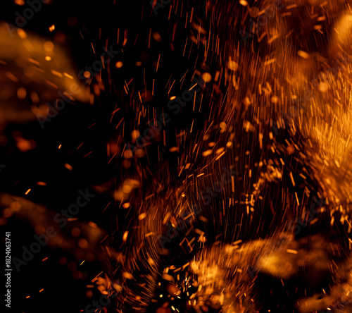 A black background with orange sparks