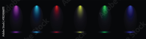 Colorful stage lights shining upward in a dark room creating a dramatic and dynamic visual effect for concerts and performances with bright beams