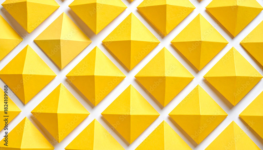 Fototapeta premium Yellow folded papers as background