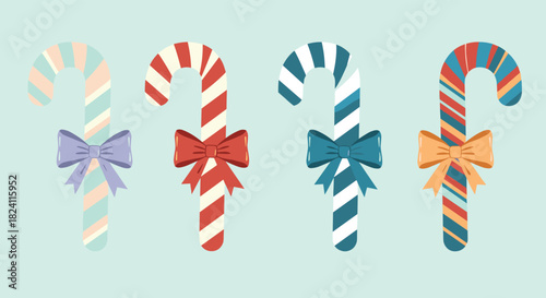 A delightful assortment of four charming candy canes, each adorned with a decorative bow and colorful stripes, presented on a soft blue background.
