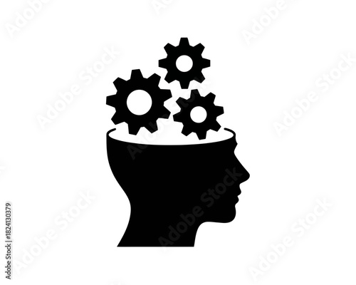 Silhouette of a head with gears inside representing the concept of thinking and processing ideas