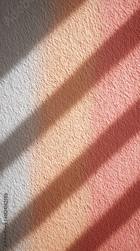 Soft shadow stripes on textured wall warm tones