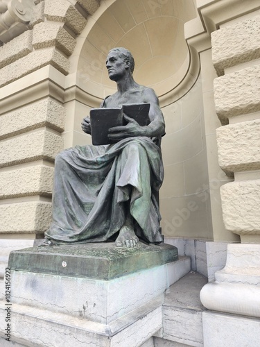 This statue, part of the Renaissance architecture, stands outside the Swiss Parliament building, one of the most important historical buildings.