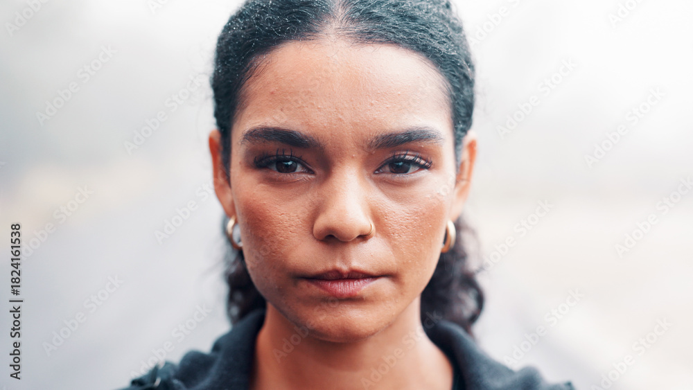 Fototapeta premium Fitness, portrait and serious with woman outdoor for cardio training, dedication or workout. Commitment, exercise and overcast with athlete or runner in nature for activity, health or wellness