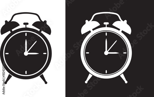 Classic twin bell alarm clock icon set in black and white for time management and deadline concepts