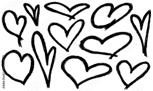 Graffiti spray heart set. Urban airbrush scribble ink heart shapes. Grunge grafitti stains and aerosol elements for Valentines Day and romantic. Vector textured underground urban elements
 