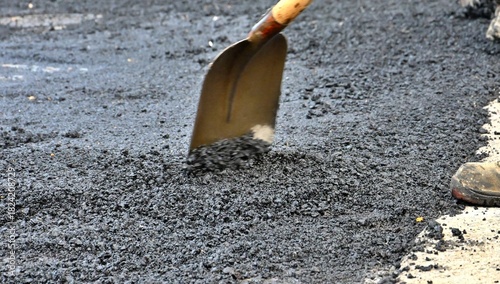 repairing asphalt road, municipal theme