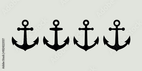 Four black nautical anchors arranged in a row on a light background