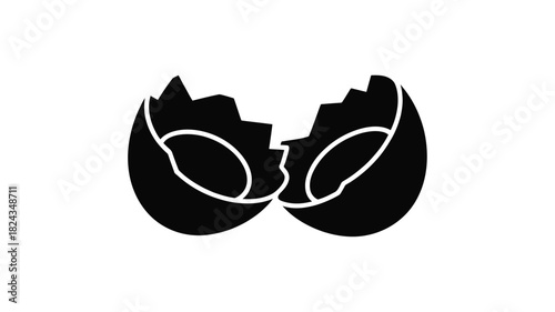 Abstract black silhouette of a cracked egg symbolizing new beginnings and growth