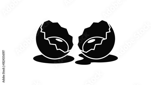 Black silhouette of two cracked eggs with yolk showing on white background