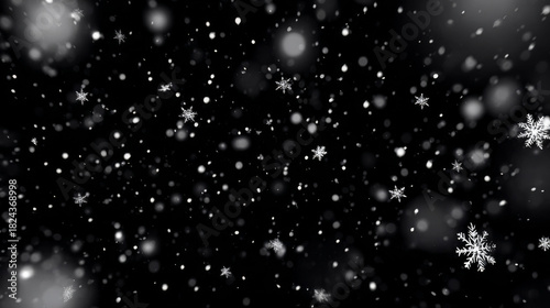 White snow overlay layer isolated on black background snowflakes bokeh, and snowfall for Christmas and holiday design. Seamless loop