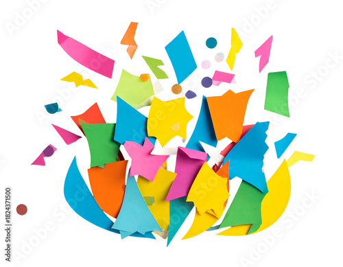Colorful paper scraps scattered and layered
