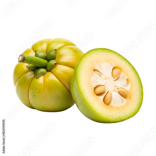 Fresh Garcinia cambogia, whole and halved, isolated on transparent background
