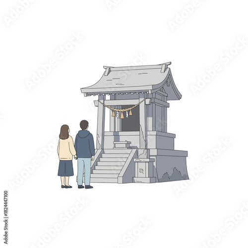 Couple paying respects at a quaint Shinto shrine evoking a sense of tradition and quiet reflection