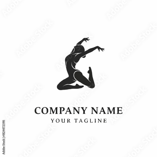 Graceful female dancer in mid-air leap, showcasing elegant movement and athletic form.